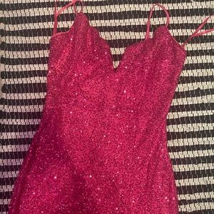 My recent homecoming dress, pink sparkles. Stops mid thigh